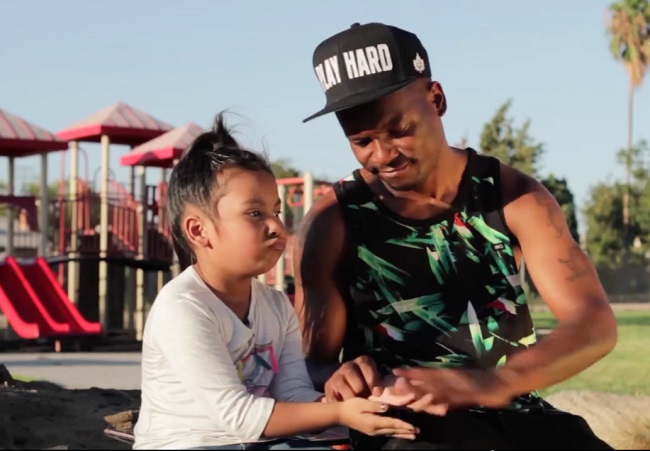 Fashawn-with-his-daughter
